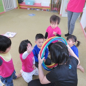 Gymnastics with hula hoop